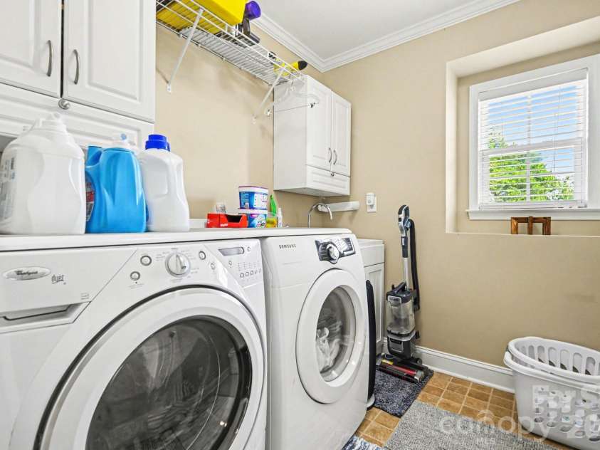 230 Lylic Woods Drive, Fort Mill, SC 29715.  MLS# CAR4375765, YatesRealty ID 18011. Upstairs Laundry with Sink