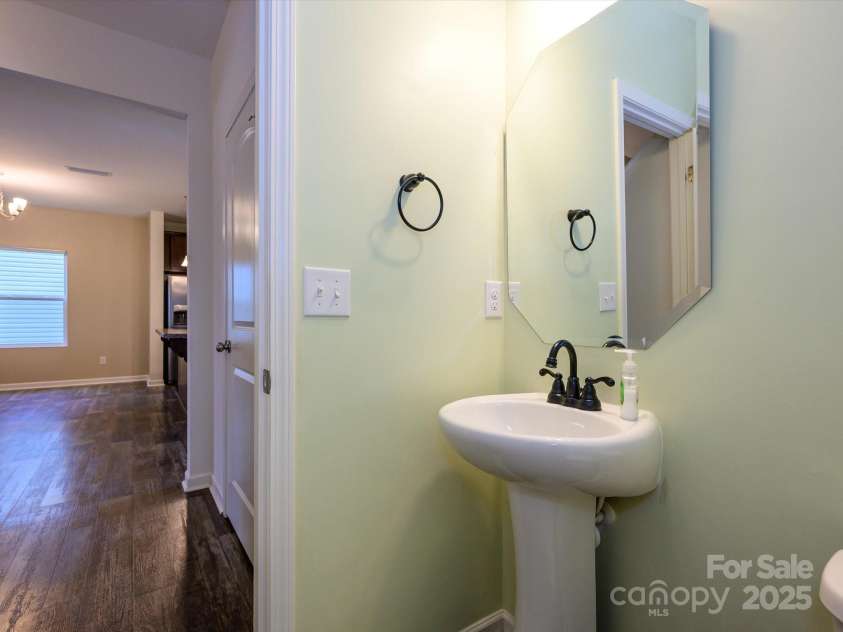 13022 Hill Pine Road, Midland, NC 28107.  MLS# CAR4265000, YatesRealty ID 18016. Powder Room on the main floor