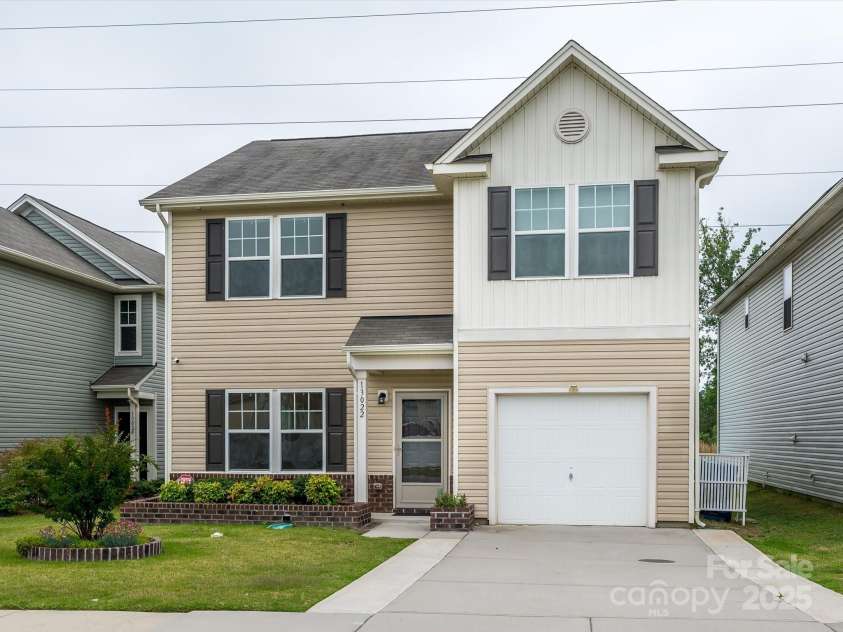 13022 Hill Pine Road, Midland, NC 28107.  MLS# CAR4265000, YatesRealty ID 18016. Seller upgraded front yard by adding brick planters