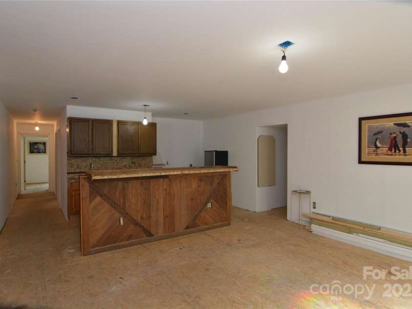 140 Ivy Trails Road, Weaverville, NC 28787.  MLS# CAR4228155, YatesRealty ID 18018. Living / Kitchen Area