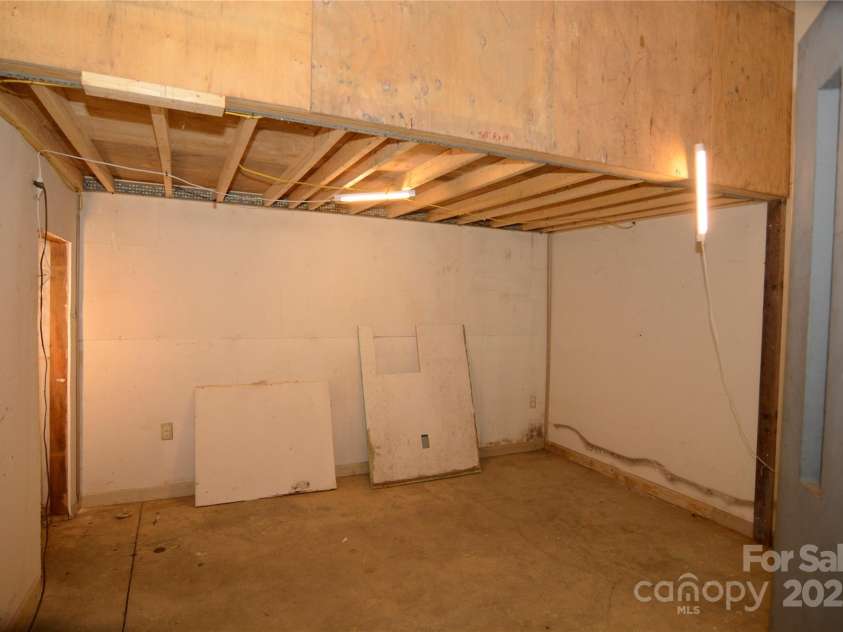 140 Ivy Trails Road, Weaverville, NC 28787.  MLS# CAR4228155, YatesRealty ID 18018. Main Level Storage Room #3