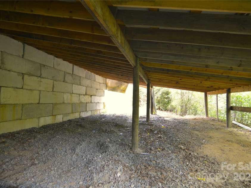 140 Ivy Trails Road, Weaverville, NC 28787.  MLS# CAR4228155, YatesRealty ID 18018. Upper Storage Area