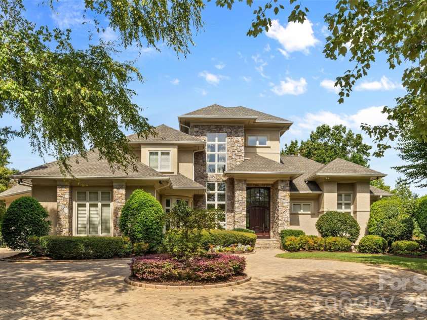 14606 Jockeys Ridge Drive, Charlotte, NC 28277.  MLS# CAR4356748, YatesRealty ID 18019. The curb is understated. That is intentional.