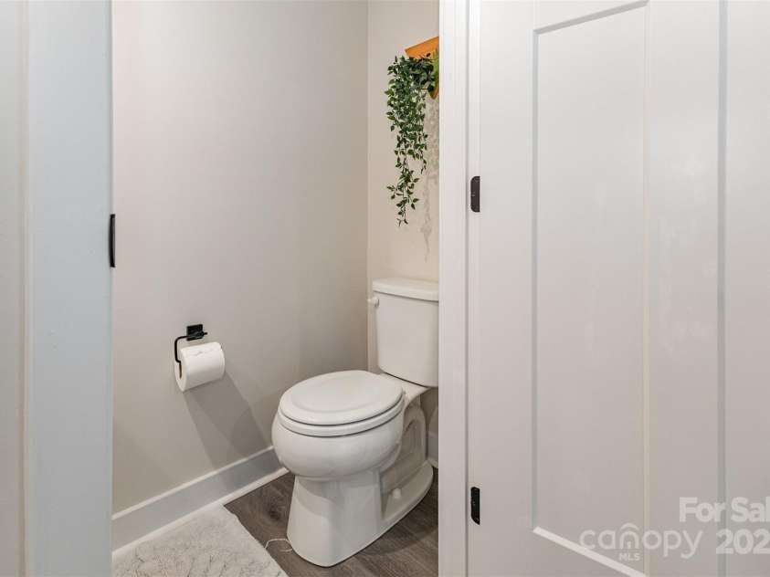 2203 Autumn Olive Lane, Stallings, NC 28104.  MLS# CAR4266791, YatesRealty ID 18025. Entry level powder room