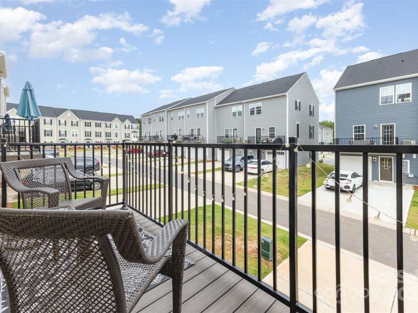 2203 Autumn Olive Lane, Stallings, NC 28104.  MLS# CAR4266791, YatesRealty ID 18025. Extended balcony