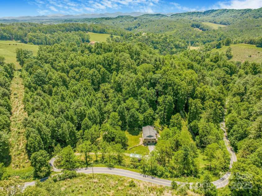 276 Morgan Branch Road, Marshall, NC 28753.  MLS# CAR4264012, YatesRealty ID 18026. On a quiet, rustic road with amazing veiws