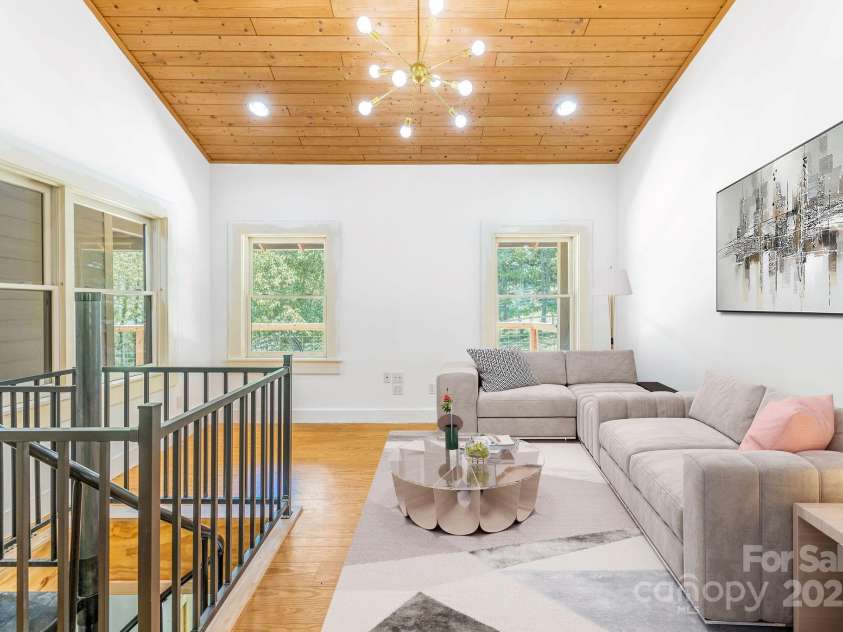 276 Morgan Branch Road, Marshall, NC 28753.  MLS# CAR4264012, YatesRealty ID 18026. Open floor plan with living room connected to dining room and kitchen