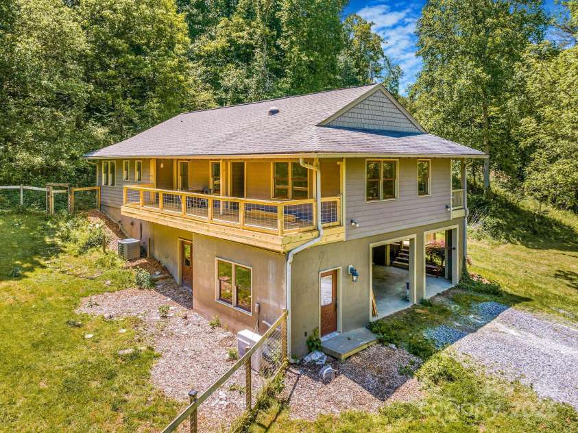 276 Morgan Branch Road, Marshall, NC 28753.  MLS# CAR4264012, YatesRealty ID 18026. Sun-filled home on gentle slopes