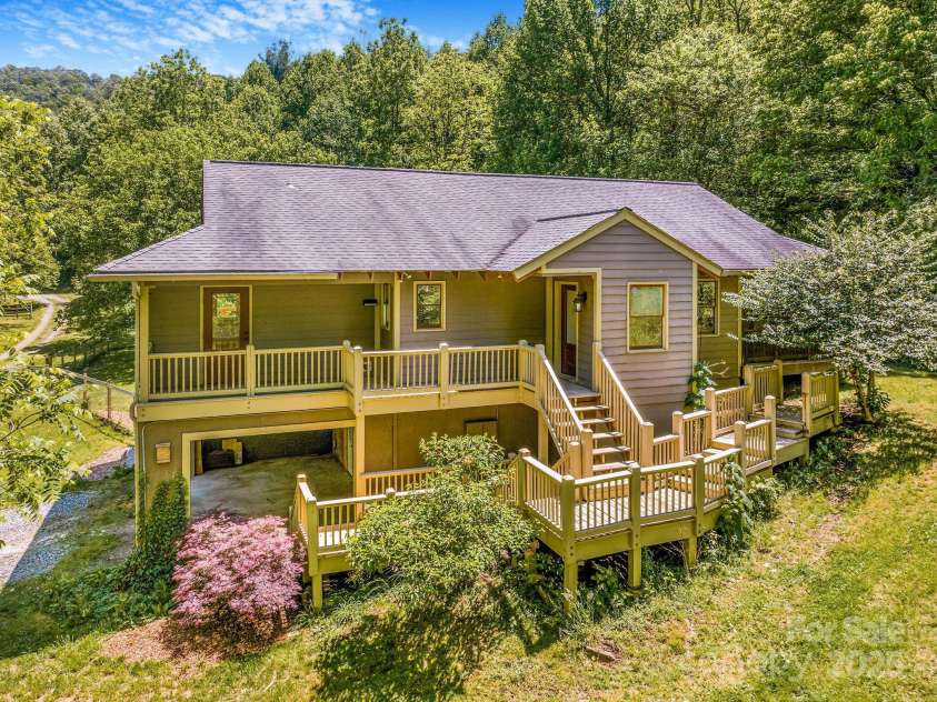 276 Morgan Branch Road, Marshall, NC 28753.  MLS# CAR4264012, YatesRealty ID 18026. Sun-filled home on gentle slopes