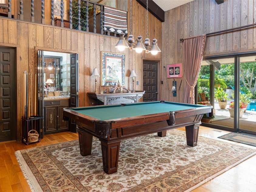 69 Forest Road, Asheville, NC 28803.  MLS# CAR4253523, YatesRealty ID 18027. Greatroom with built in bar