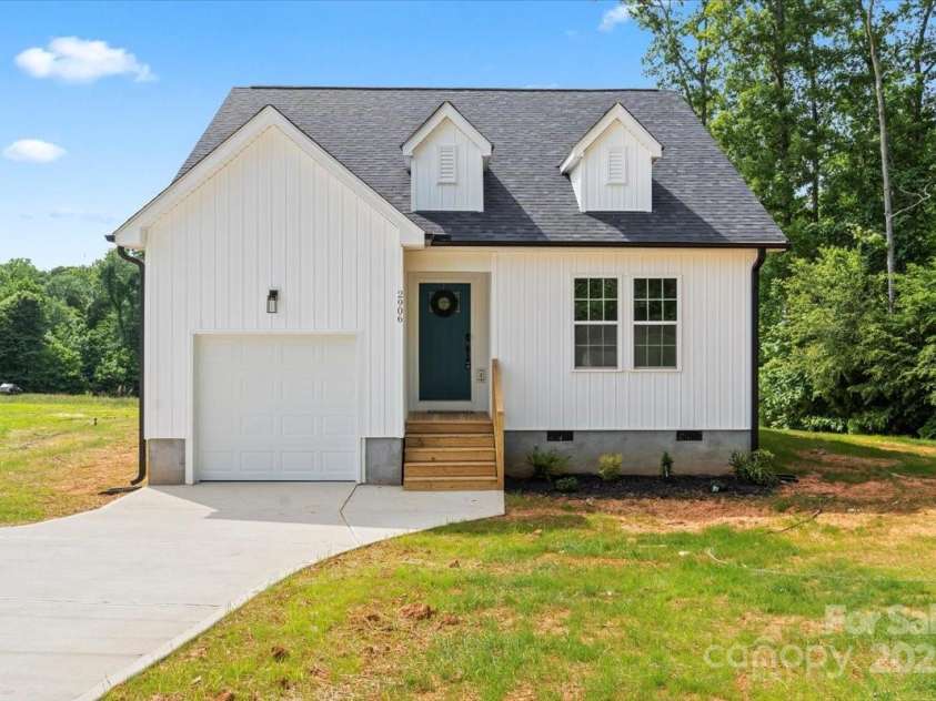 2906 Swicegood Road, Linwood, NC 27299.  MLS# CAR4263483, YatesRealty ID 18029. Front of the home 