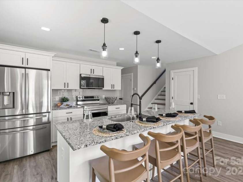 2906 Swicegood Road, Linwood, NC 27299.  MLS# CAR4263483, YatesRealty ID 18029. Kitchen with appliances included 