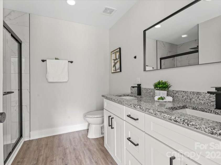 2906 Swicegood Road, Linwood, NC 27299.  MLS# CAR4263483, YatesRealty ID 18029. Primary bath