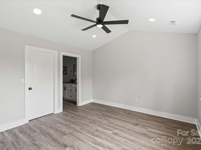 2906 Swicegood Road, Linwood, NC 27299.  MLS# CAR4263483, YatesRealty ID 18029. Primary bedroom 