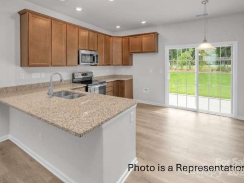 #603 Mt. Mitchell Avenue, Gastonia, NC 28052.  MLS# CAR4232323, YatesRealty ID 1803. Laurel Gourmet Kitchen/Dining Area