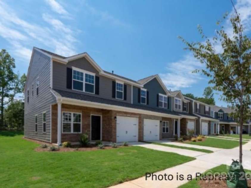 #603 Mt. Mitchell Avenue, Gastonia, NC 28052.  MLS# CAR4232323, YatesRealty ID 1803. Sierra Ridge Parkside Series 1 Car Garage Townhomes