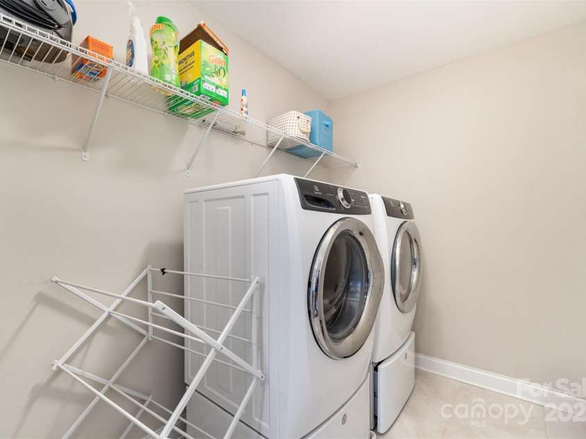 11234 Smokethorn Drive, Concord, NC 28027.  MLS# CAR4243179, YatesRealty ID 18031. Laundry room adjacent to primary suite