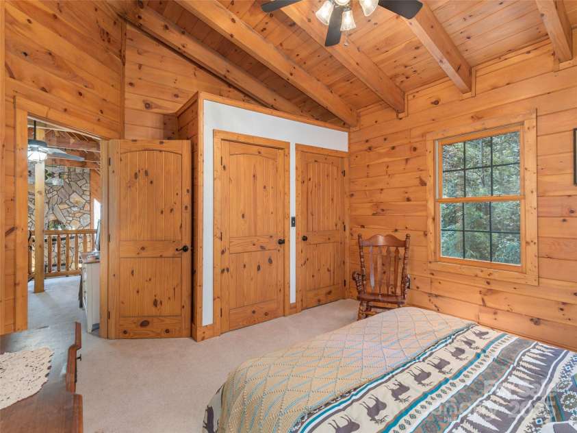 90 Junco Trail, Waynesville, NC 28785.  MLS# CAR4252158, YatesRealty ID 18032. Bedroom 2 on the Upper Level with Post & Beam Ceiling and Generously sized Closet
