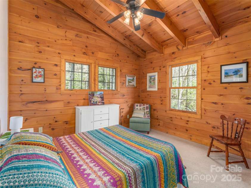 90 Junco Trail, Waynesville, NC 28785.  MLS# CAR4252158, YatesRealty ID 18032. Bedroom 3 with Post & Beam Ceiling
