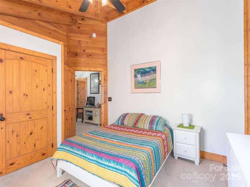 90 Junco Trail, Waynesville, NC 28785.  MLS# CAR4252158, YatesRealty ID 18032. Bedroom 3 with Post & Beam Ceiling and generously sized closet