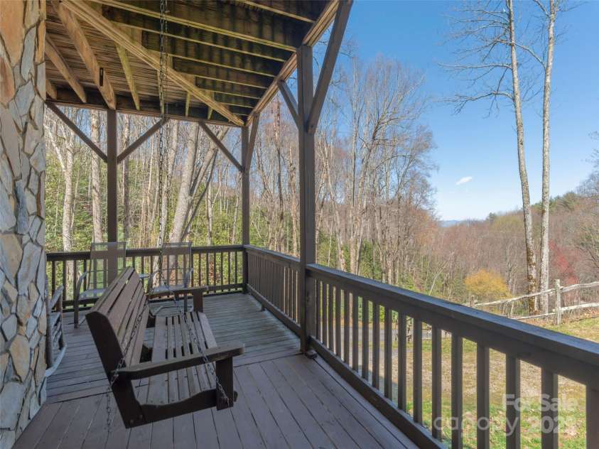 90 Junco Trail, Waynesville, NC 28785.  MLS# CAR4252158, YatesRealty ID 18032. Lower Level Porch Area