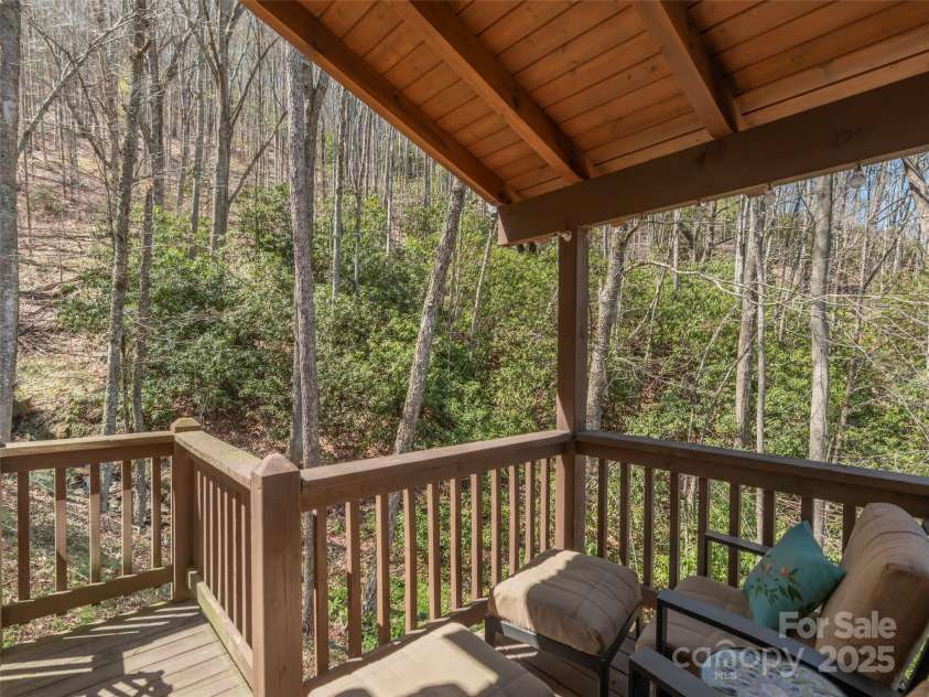 90 Junco Trail, Waynesville, NC 28785.  MLS# CAR4252158, YatesRealty ID 18032. Upper Level Porch area leading to side of house gate