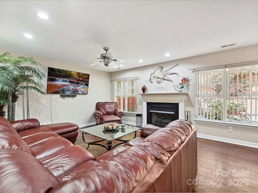 7923 Shiny Meadow Lane, Charlotte, NC 28215.  MLS# CAR4252293, YatesRealty ID 18034. A Gas Fireplace and recessed lighting enhances your living space