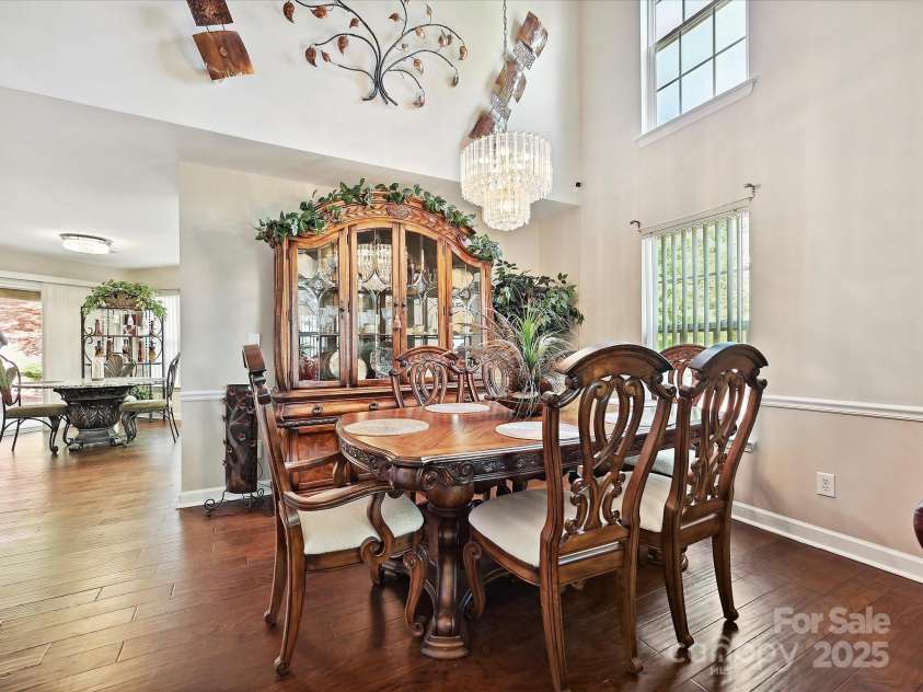 7923 Shiny Meadow Lane, Charlotte, NC 28215.  MLS# CAR4252293, YatesRealty ID 18034. Beautiful laminate hardwood flooring lends warmth.