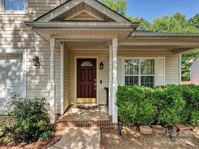 7923 Shiny Meadow Lane, Charlotte, NC 28215.  MLS# CAR4252293, YatesRealty ID 18034. Relax on your full front porch!