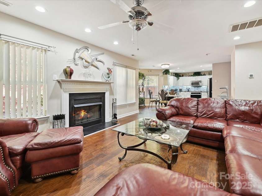 7923 Shiny Meadow Lane, Charlotte, NC 28215.  MLS# CAR4252293, YatesRealty ID 18034. The great room is open to the updated Kitchen