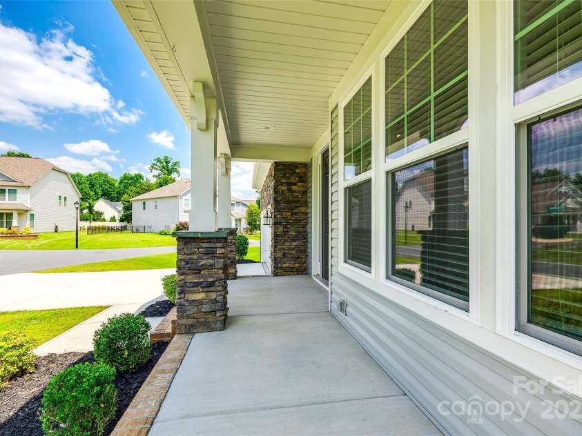 173 Morgans Branch Road, Belmont, NC 28012.  MLS# CAR4266195, YatesRealty ID 18036. Rocking Chair Front Porch