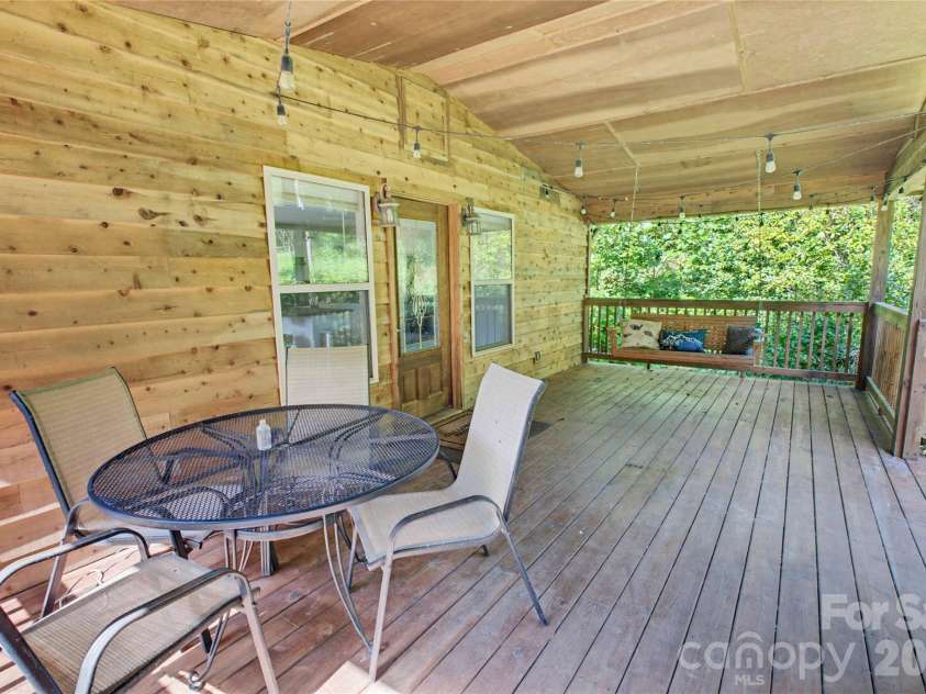 919 Country Club Drive, Cullowhee, NC 28723.  MLS# CAR4374654, YatesRealty ID 18038. HUGE covered porch!