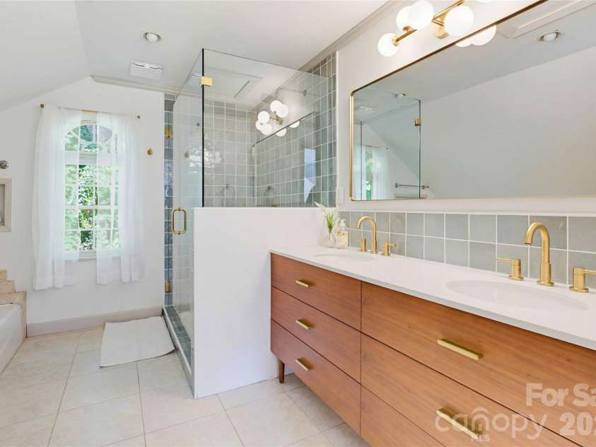 919 Country Club Drive, Cullowhee, NC 28723.  MLS# CAR4374654, YatesRealty ID 18038. New shower and vanity with modern touches!