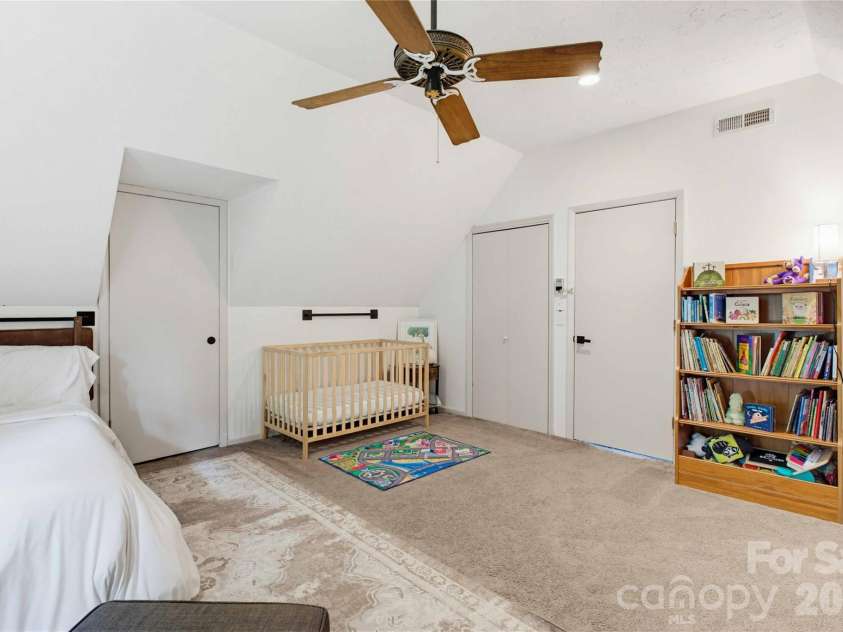 919 Country Club Drive, Cullowhee, NC 28723.  MLS# CAR4374654, YatesRealty ID 18038. Oversized second bedroom upstairs.