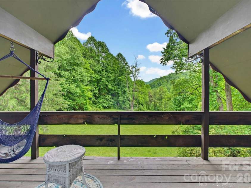 919 Country Club Drive, Cullowhee, NC 28723.  MLS# CAR4374654, YatesRealty ID 18038. Primary bedroom balcony and view.