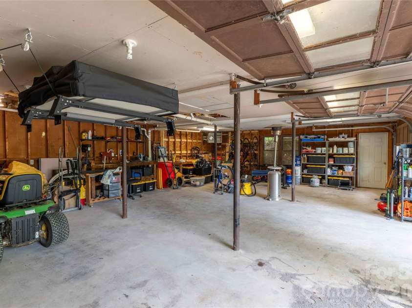 919 Country Club Drive, Cullowhee, NC 28723.  MLS# CAR4374654, YatesRealty ID 18038. Three car garage space.