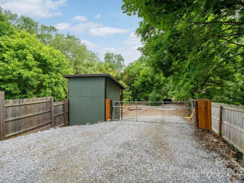 72 Rock Hill Road, Asheville, NC 28803.  MLS# CAR4250298, YatesRealty ID 18042. Driveway to back of lot