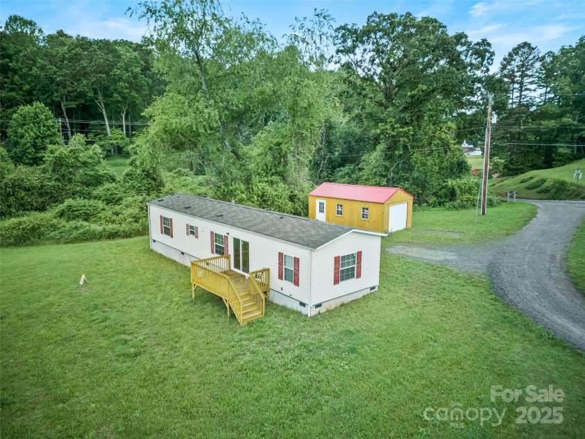 38 Kemp Road, Pisgah Forest, NC 28768.  MLS# CAR4265106, YatesRealty ID 18044. 