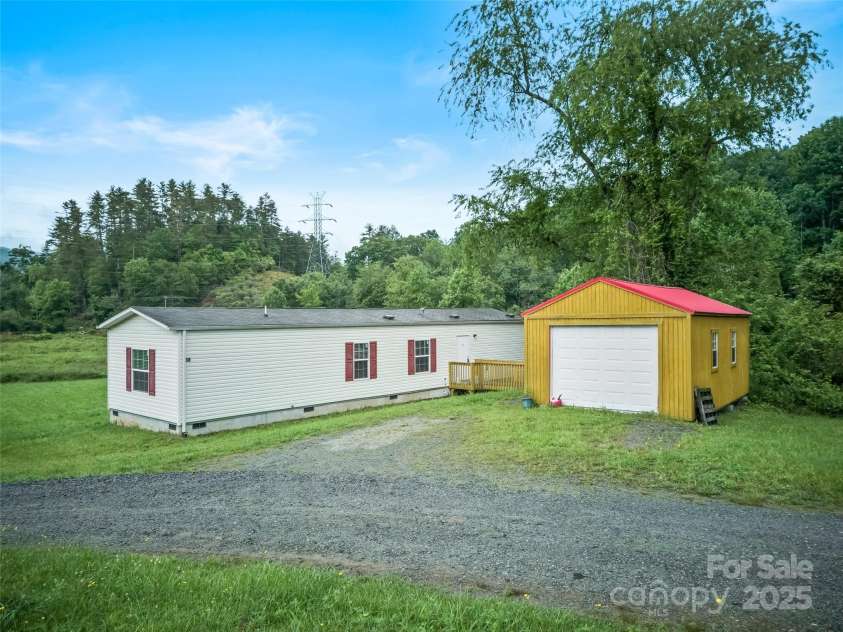 38 Kemp Road, Pisgah Forest, NC 28768.  MLS# CAR4265106, YatesRealty ID 18044. 