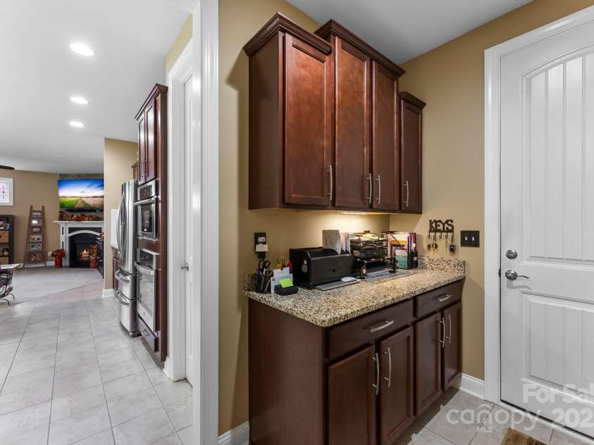 708 Ardent Trail, Belmont, NC 28012.  MLS# CAR4267036, YatesRealty ID 18047. Drop zone from garage