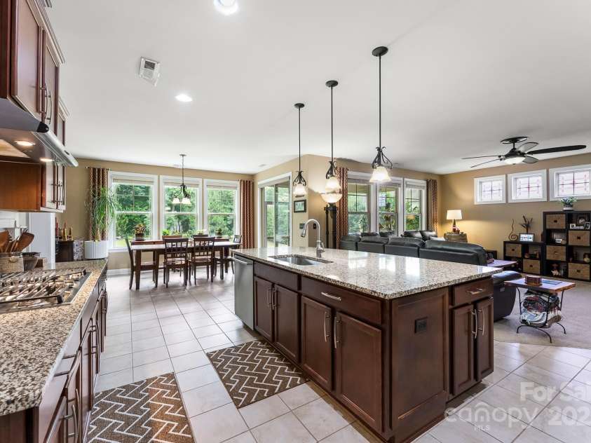 708 Ardent Trail, Belmont, NC 28012.  MLS# CAR4267036, YatesRealty ID 18047. Spacious kitchen overlooking living room