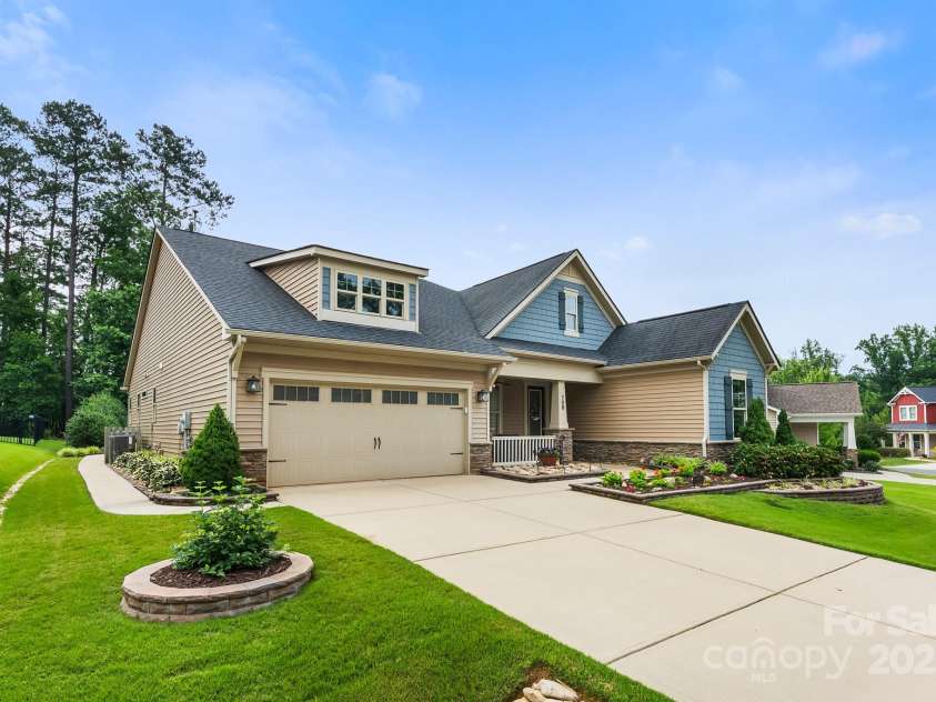 708 Ardent Trail, Belmont, NC 28012.  MLS# CAR4267036, YatesRealty ID 18047. Upgraded sidewalk connecting driveway to backyard.