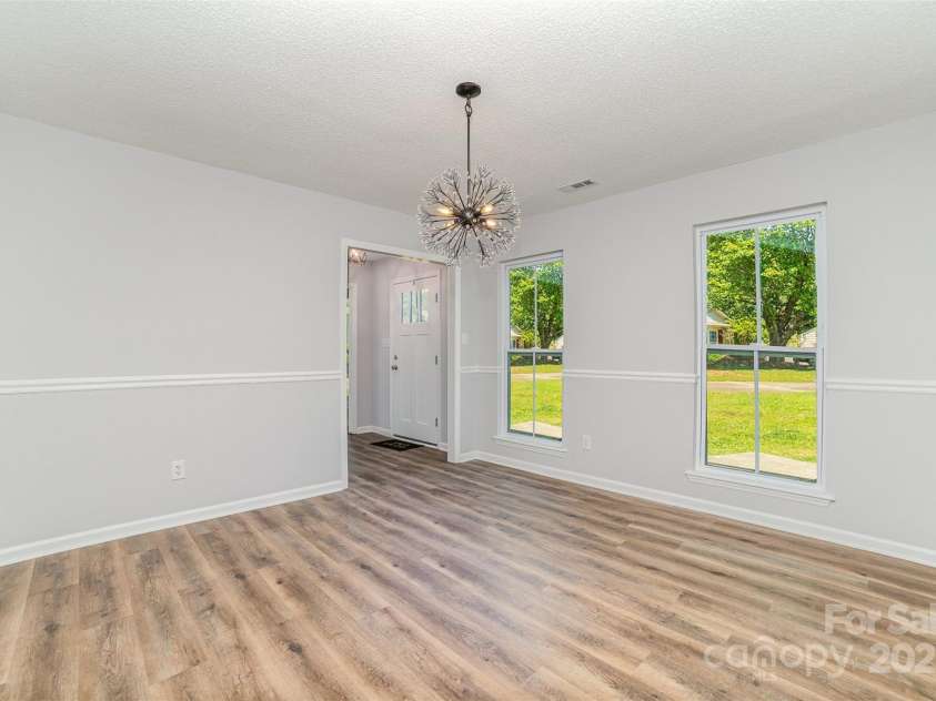 1640 English Knoll Drive, Matthews, NC 28105.  MLS# CAR4249167, YatesRealty ID 18051. Dining Room view from kitchen