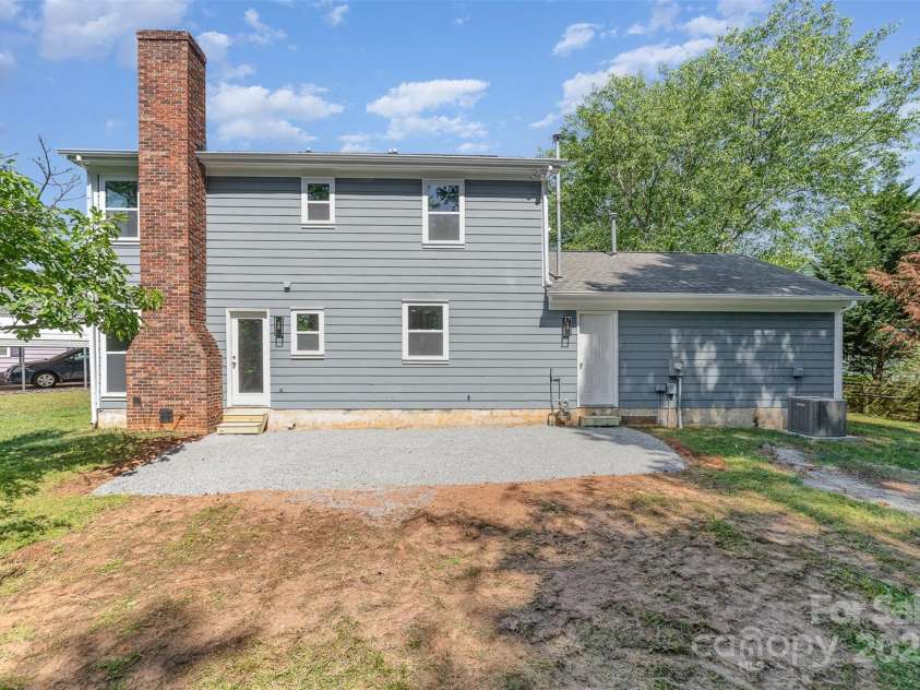 1640 English Knoll Drive, Matthews, NC 28105.  MLS# CAR4249167, YatesRealty ID 18051. Exterior Rear of Home