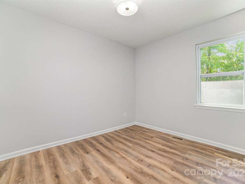 1640 English Knoll Drive, Matthews, NC 28105.  MLS# CAR4249167, YatesRealty ID 18051. Upstairs Bedroom #1