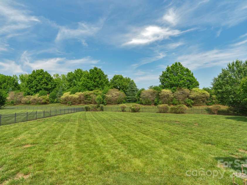 9008 Skipaway Drive, Waxhaw, NC 28173.  MLS# CAR4244086, YatesRealty ID 18063. Backyard
