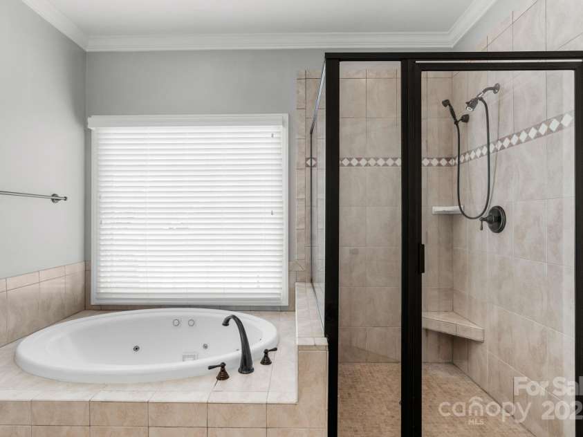 9008 Skipaway Drive, Waxhaw, NC 28173.  MLS# CAR4244086, YatesRealty ID 18063. Primary Bathroom