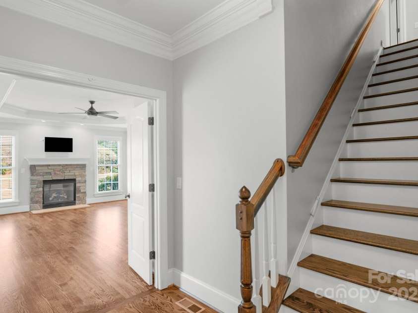 9008 Skipaway Drive, Waxhaw, NC 28173.  MLS# CAR4244086, YatesRealty ID 18063. Secondary Stairway