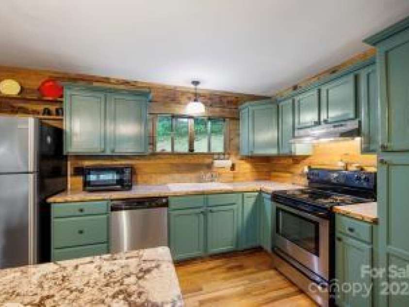 395 Old Fiddle Road, Waynesville, NC 28786.  MLS# CAR4184679, YatesRealty ID 1807. 