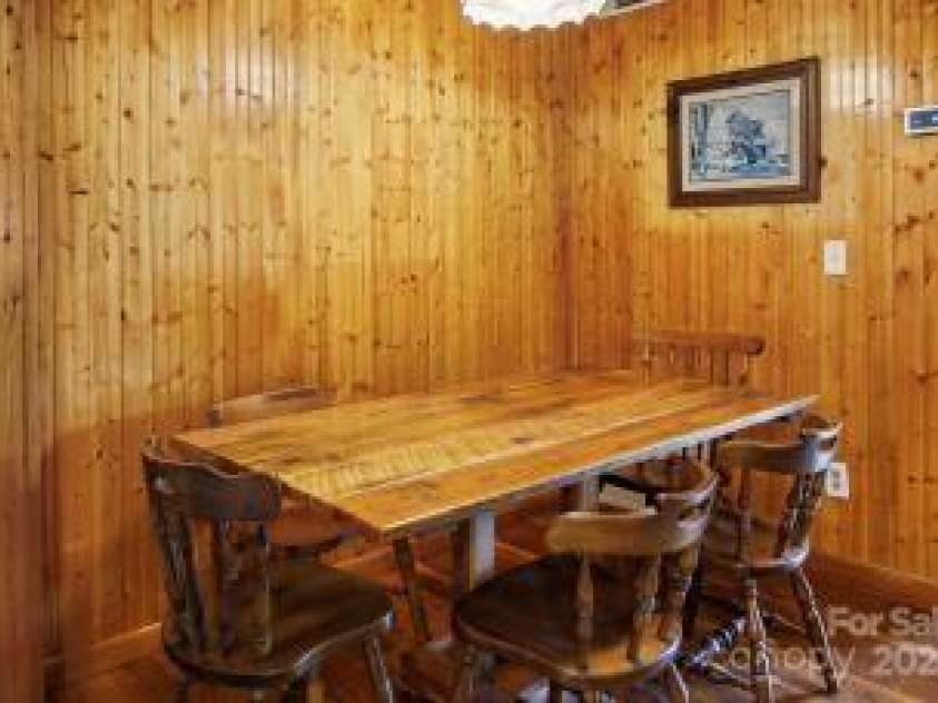 395 Old Fiddle Road, Waynesville, NC 28786.  MLS# CAR4184679, YatesRealty ID 1807. Dining area